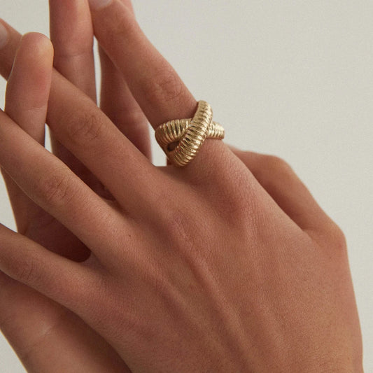 Cross-over Ring